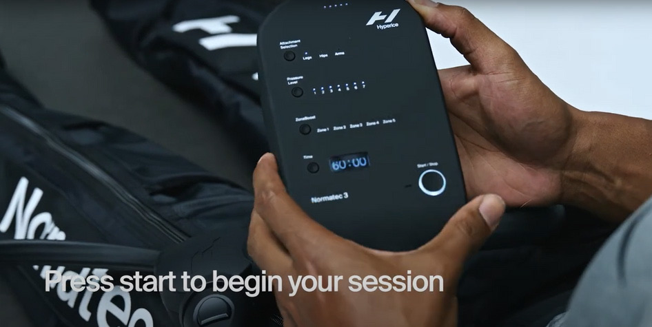 Normatec 3 control unit — attachment, pressure, ZoneBoost and time controls with the start button